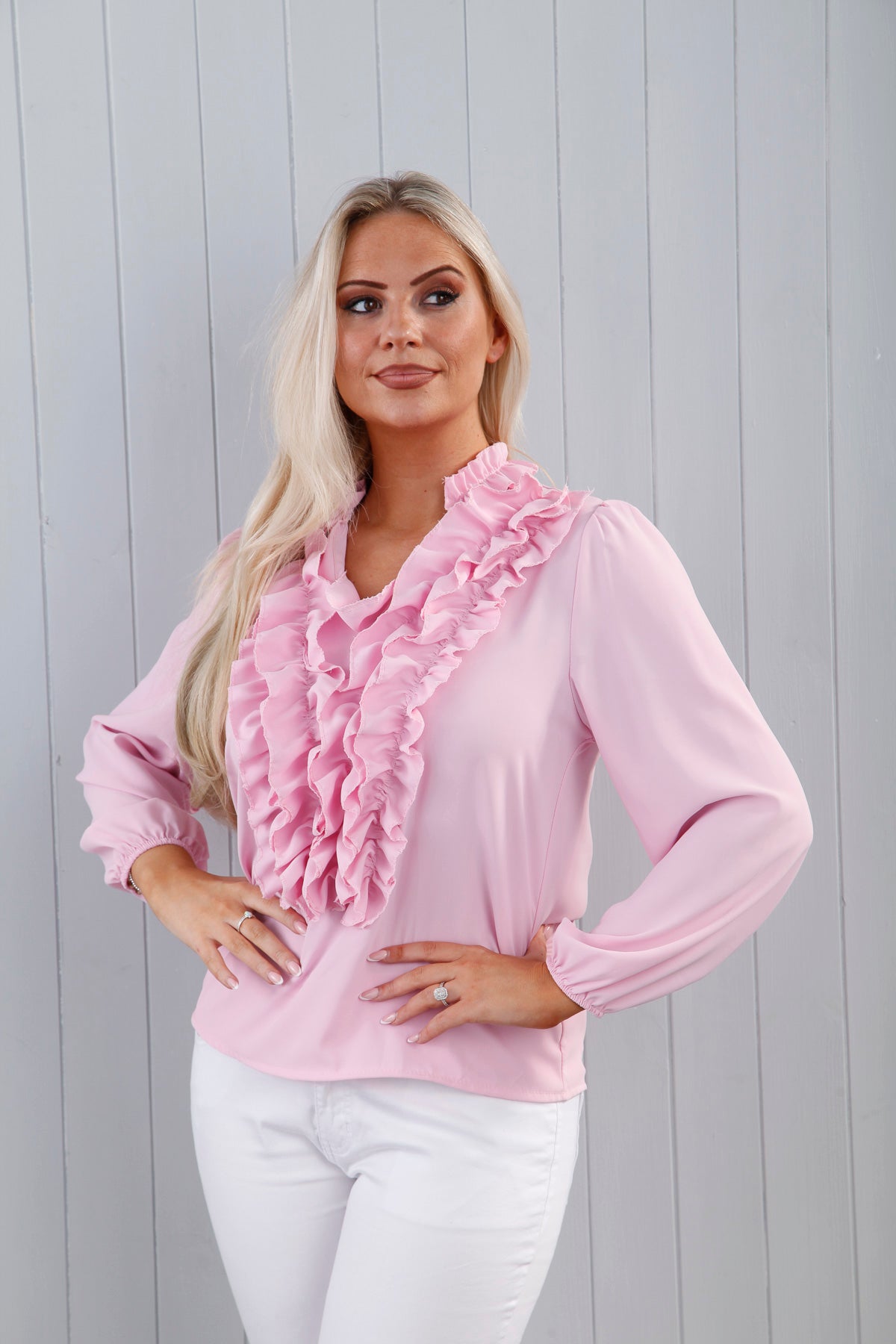 pink frilly blouse