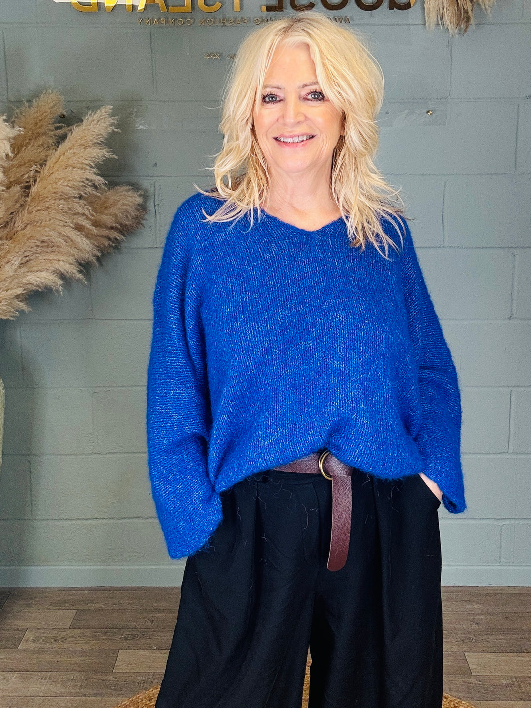 Fluffy V-Neck Alpaca Blend Jumper
The cosy, cloud soft knit you’ll reach for on repeat – slouchy, flattering and effortlessly chic.

Why you’ll love it:

Super soft fluffy knit with a luxe alpaca blend feel
Easy V-neckline – perfect for layering over vests, tees or a shirt
Relaxed, oversized fit for that thrown-on-and-go vibe
Lightweight warmth (cosy without feeling bulky)
Available in 4 colours

Fit &amp; Sizing:
Free size – fits comfortably up to a UK 18 (slouchy/oversized style).

Measurements (approx):
