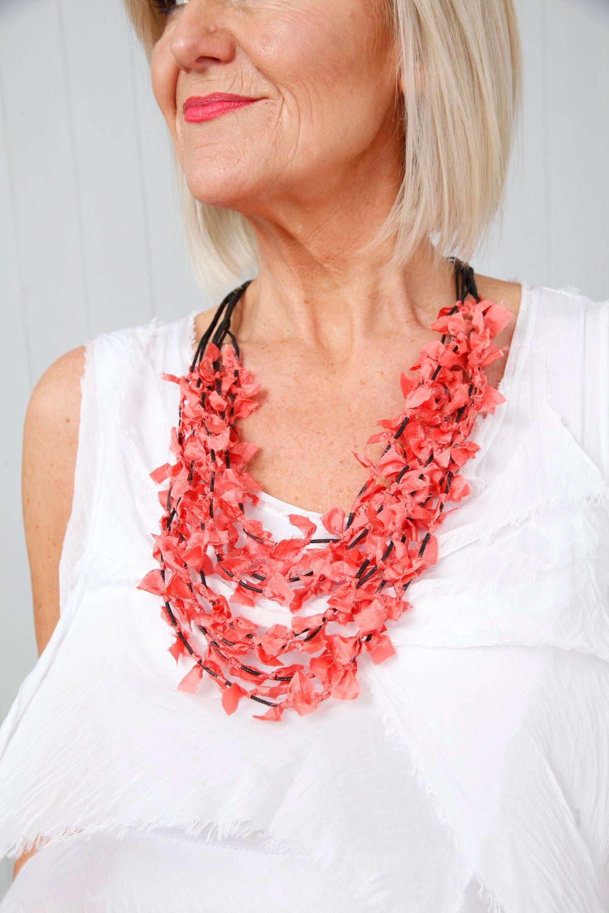 Coral necklace hi-res stock photography and images - Alamy